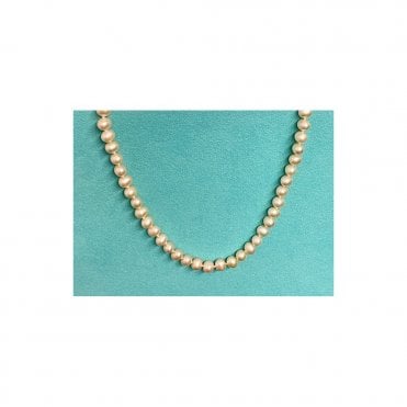Ivory Peach String of Pearls